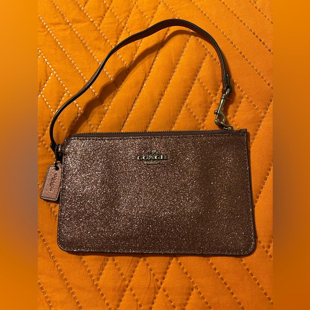 Coach Plum Glitter Wristlet